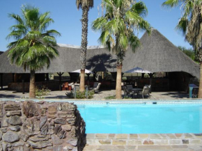 Отель Rooisand Desert Ranch  Chausib